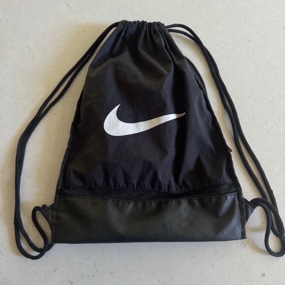 Nike Black Drawstring Backpack with White Swoosh